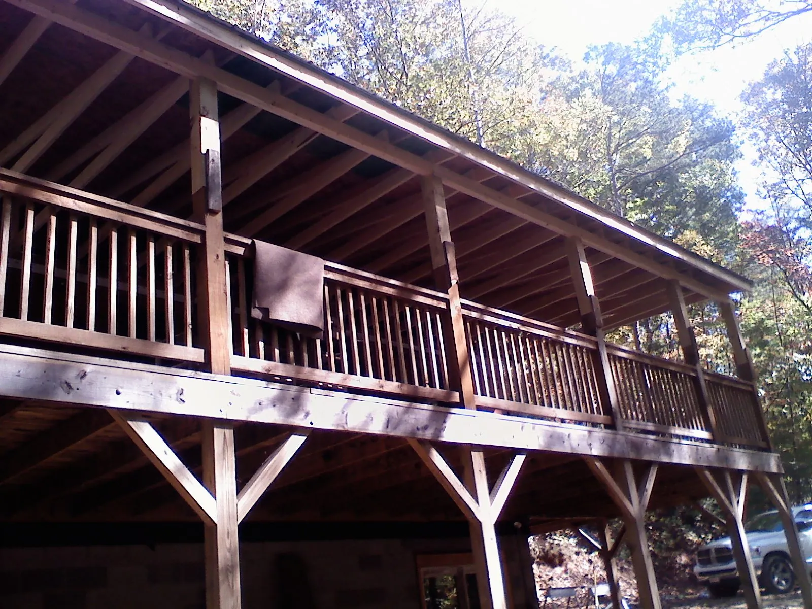 Timber framing under a new elevated porch and deck — Roof Leak Repair in Mingo Junction by Roofing Brothers